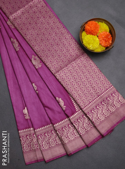 Semi soft silk saree wine shade with allover zari woven buttas and zari woven border