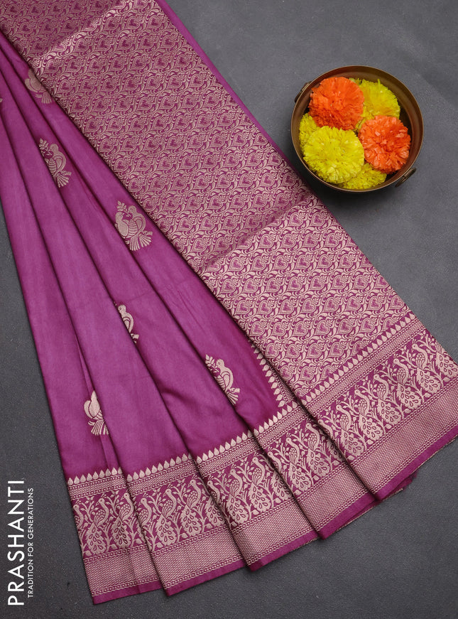 Semi soft silk saree wine shade with allover zari woven buttas and zari woven border