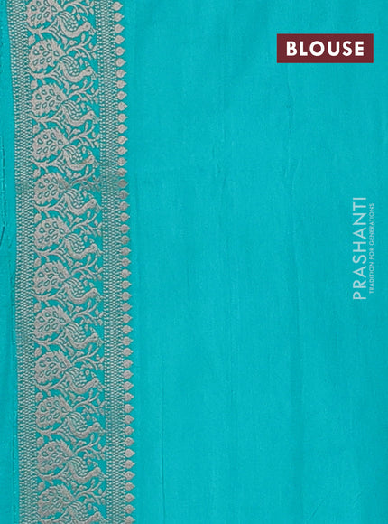 Semi soft silk saree teal green with allover zari woven buttas and zari woven border