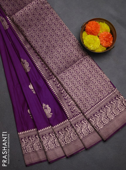 Semi soft silk saree purple with allover zari woven buttas and zari woven border