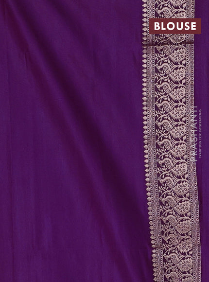 Semi soft silk saree purple with allover zari woven buttas and zari woven border