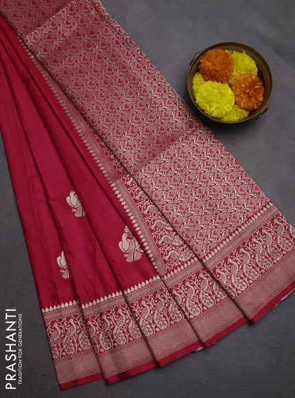 Semi soft silk saree pink with allover zari woven buttas and zari woven border