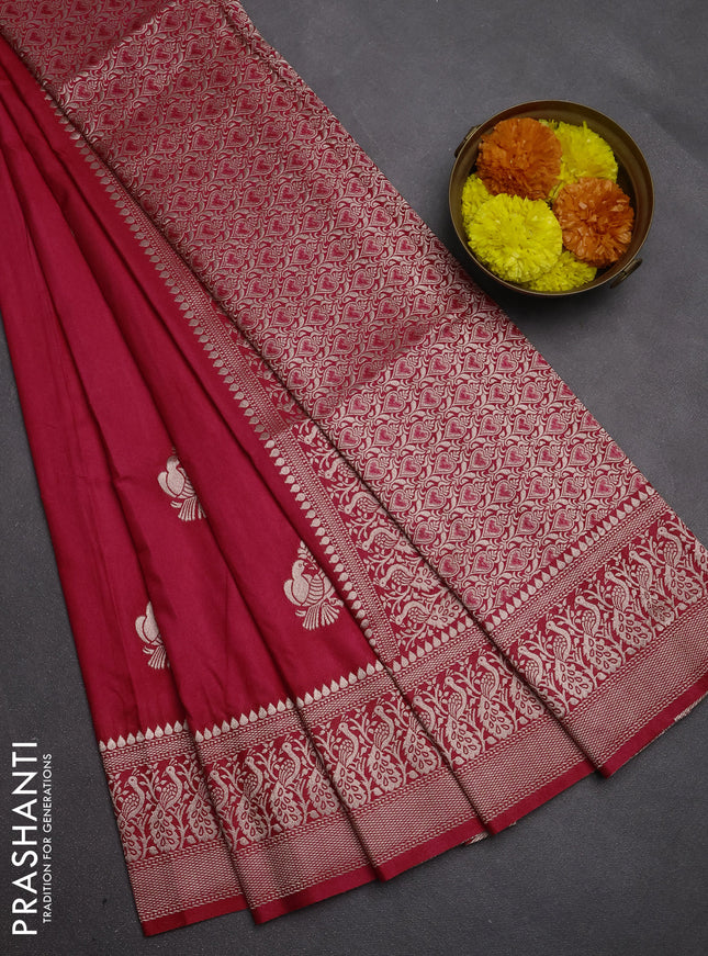Semi soft silk saree pink with allover zari woven buttas and zari woven border