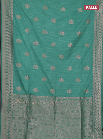 Semi soft silk saree pastel green shade with allover zari woven buttas and zari woven border