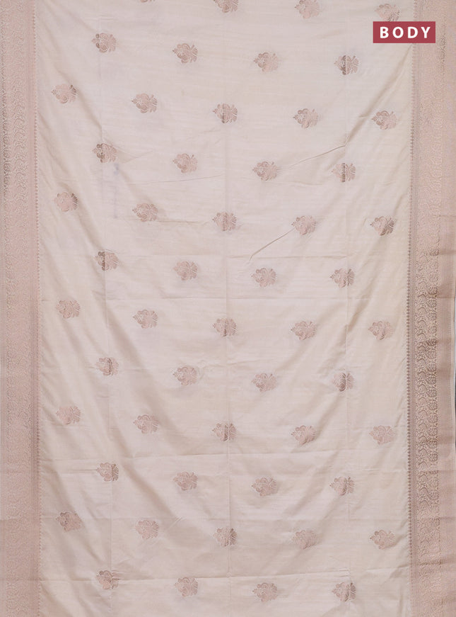 Semi soft silk saree cream with allover zari woven buttas and zari woven border