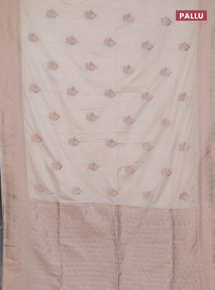 Semi soft silk saree cream with allover zari woven buttas and zari woven border