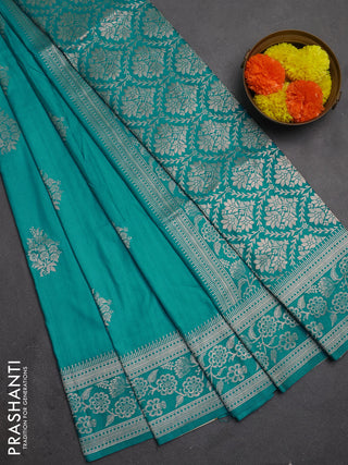 Semi soft silk saree teal blue with floral zari woven buttas and zari woven border