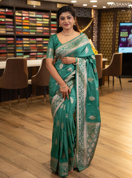 Semi soft silk saree pastel green with floral zari woven buttas and zari woven border