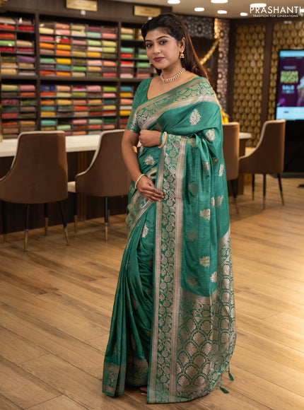 Semi soft silk saree pastel green with floral zari woven buttas and zari woven border