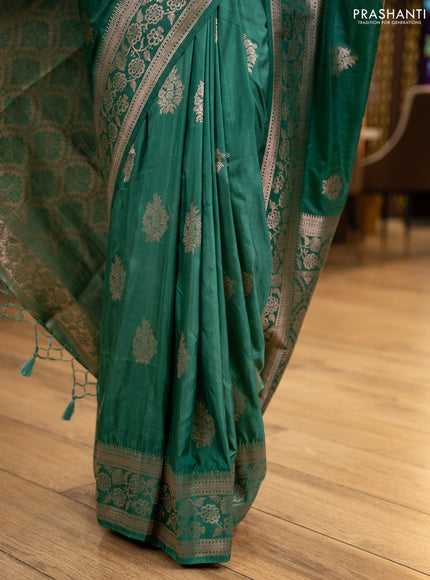 Semi soft silk saree pastel green with floral zari woven buttas and zari woven border