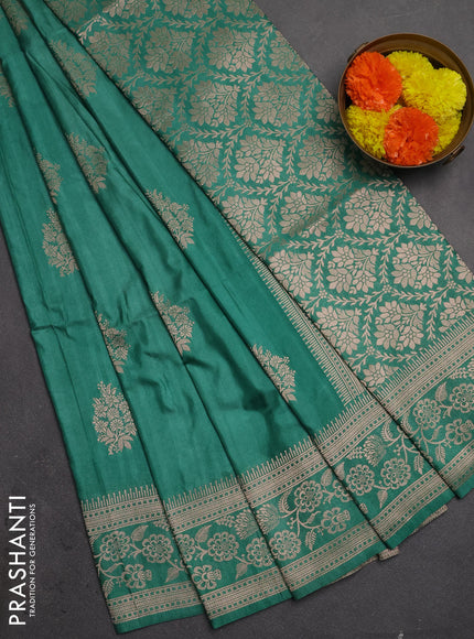 Semi soft silk saree pastel green with floral zari woven buttas and zari woven border