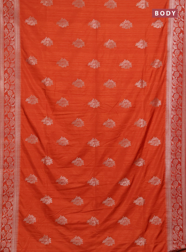 Semi soft silk saree rust shade with floral zari woven buttas and zari woven border