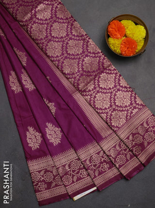Semi soft silk saree wine shade with floral zari woven buttas and zari woven border