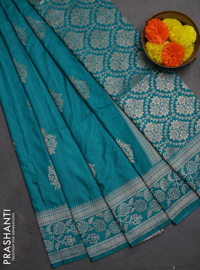 Semi soft silk saree teal green with floral zari woven buttas and zari woven border