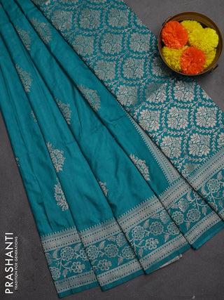 Semi soft silk saree teal green with floral zari woven buttas and zari woven border