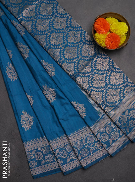 Semi soft silk saree cs blue with floral zari woven buttas and zari woven border