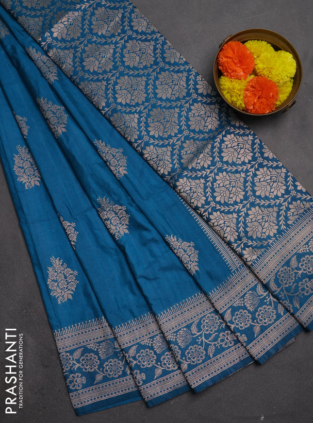 Semi soft silk saree cs blue with floral zari woven buttas and zari woven border