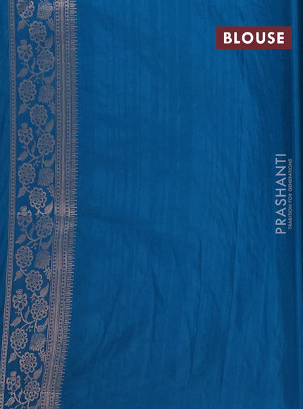 Semi soft silk saree cs blue with floral zari woven buttas and zari woven border