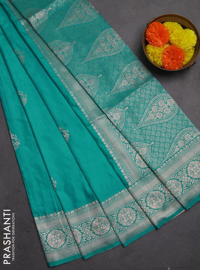 Semi soft silk saree teal blue with zari woven buttas and zari woven border