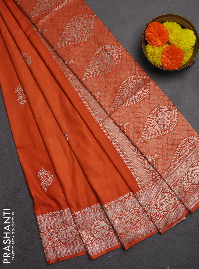 Semi soft silk saree rust shade with zari woven buttas and zari woven border