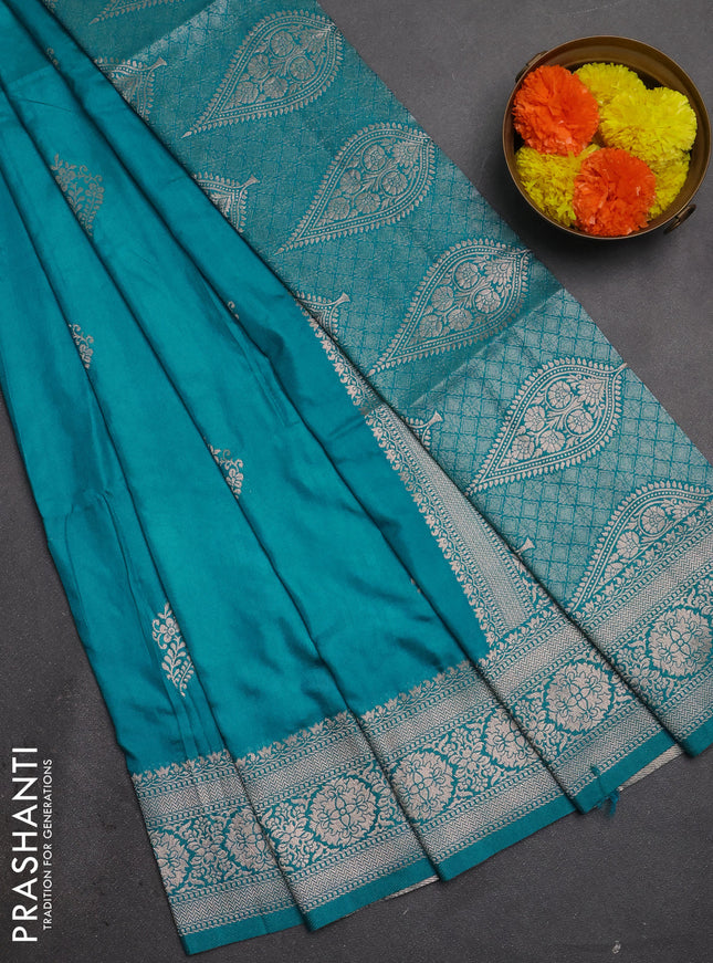 Semi soft silk saree teal blue with zari woven buttas and zari woven border