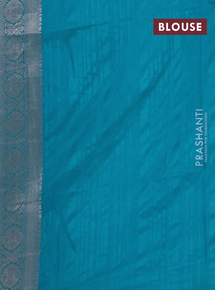 Semi soft silk saree teal blue with zari woven buttas and zari woven border