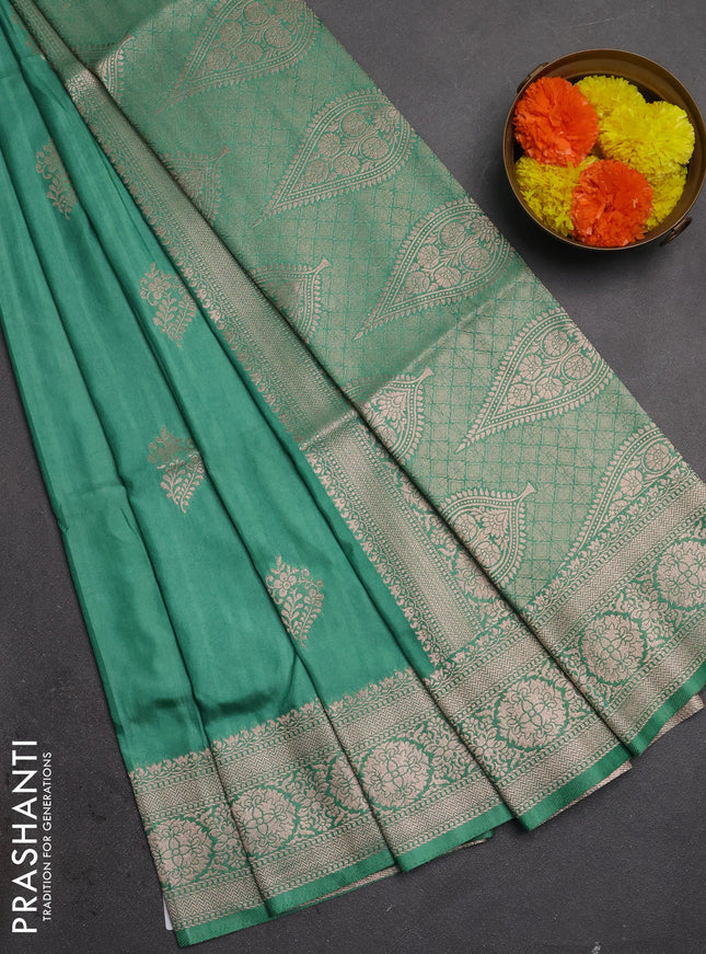 Semi soft silk saree pastel green with zari woven buttas and zari woven border