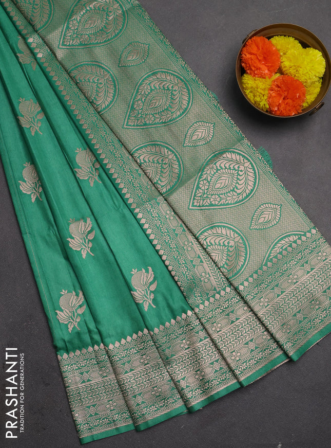 Semi soft silk saree pastel green with zari woven buttas and zari woven border