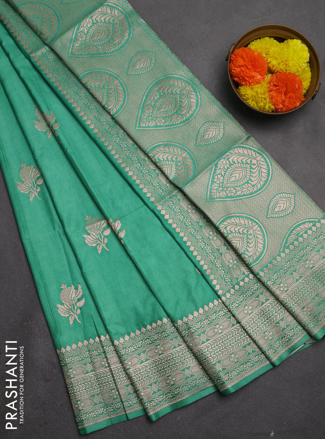 Semi soft silk saree pastel green with zari woven buttas and zari woven border