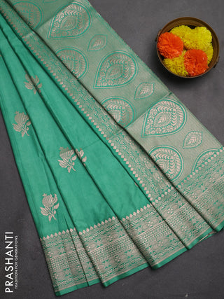Semi soft silk saree pastel green with zari woven buttas and zari woven border
