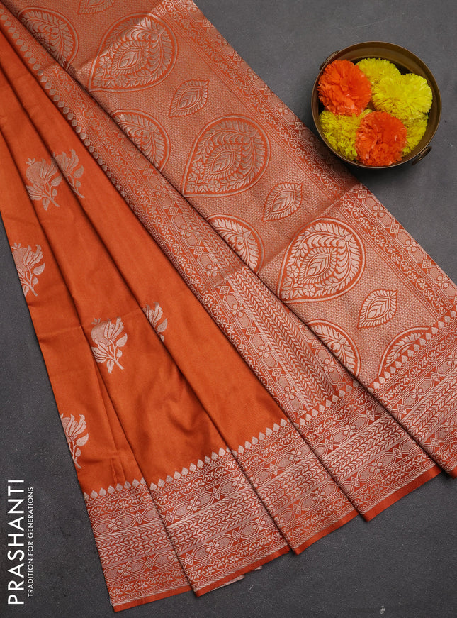 Semi soft silk saree rust shade with zari woven buttas and zari woven border