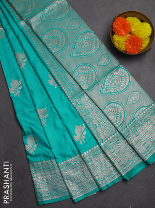 Semi soft silk saree teal blue with zari woven buttas and zari woven border