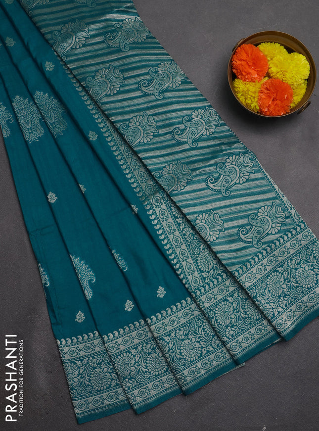 Semi soft silk saree teal blue with allover zari woven buttas and zari woven border