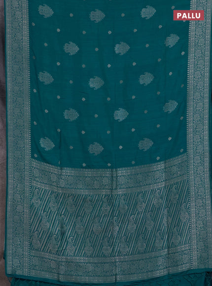 Semi soft silk saree teal blue with allover zari woven buttas and zari woven border