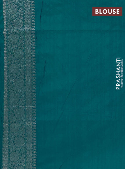 Semi soft silk saree teal blue with allover zari woven buttas and zari woven border