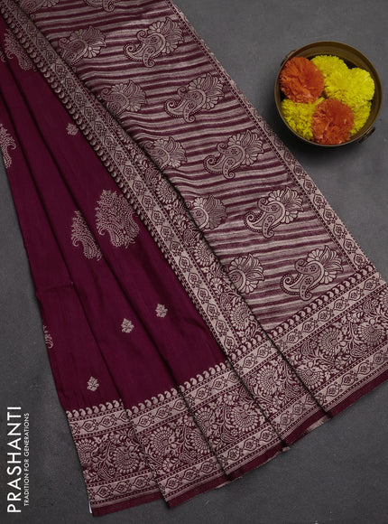 Semi soft silk saree wine shade with allover zari woven buttas and zari woven border