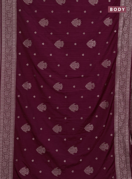 Semi soft silk saree wine shade with allover zari woven buttas and zari woven border