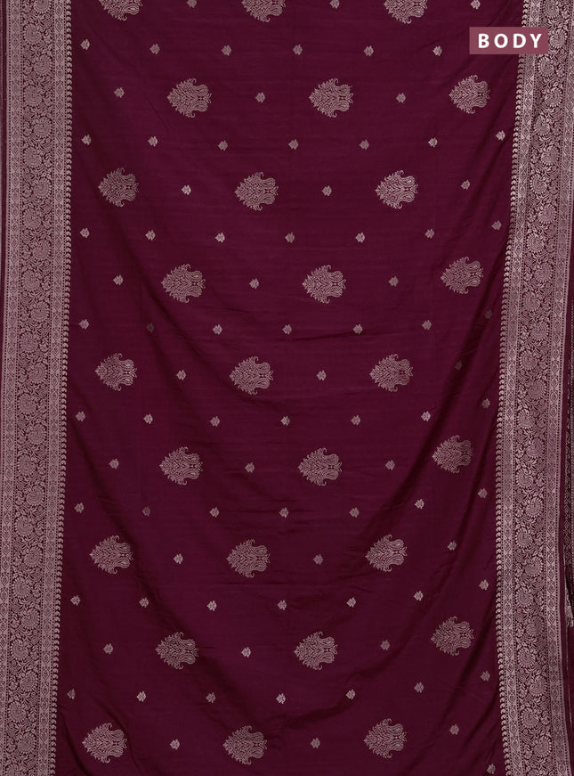 Semi soft silk saree wine shade with allover zari woven buttas and zari woven border