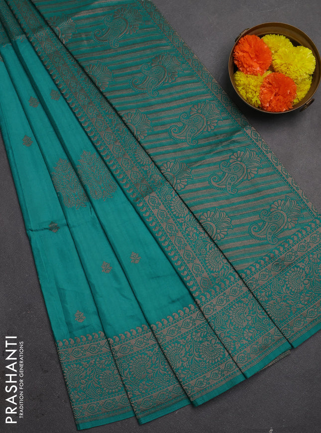 Semi soft silk saree teal green with allover zari woven buttas and zari woven border