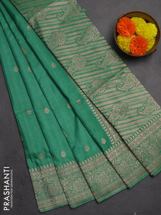 Semi soft silk saree pastel green with allover zari woven buttas and zari woven border