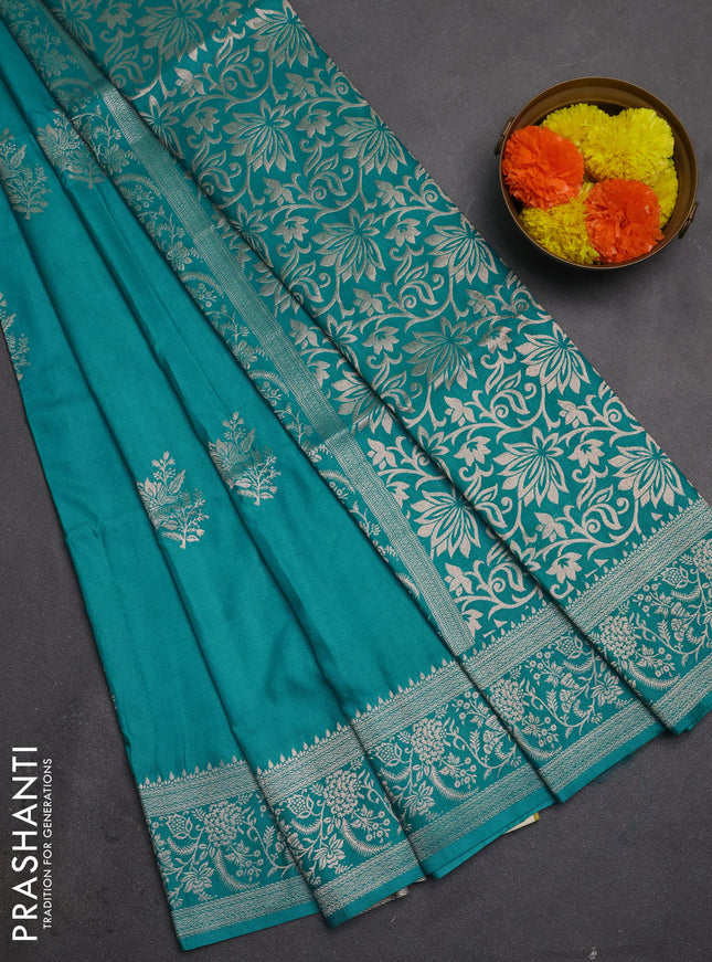 Semi soft silk saree teal shade with floral zari woven buttas and zari woven border