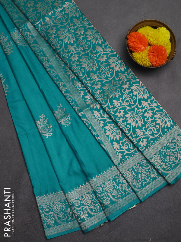 Semi soft silk saree teal shade with floral zari woven buttas and zari woven border