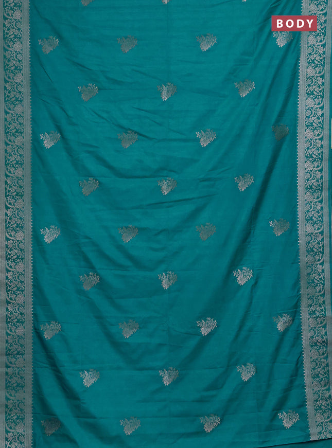 Semi soft silk saree teal shade with floral zari woven buttas and zari woven border
