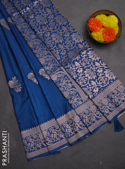 Semi soft silk saree peacock blue with floral zari woven buttas and zari woven border
