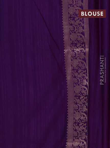 Semi soft silk saree purple with floral zari woven buttas and zari woven border