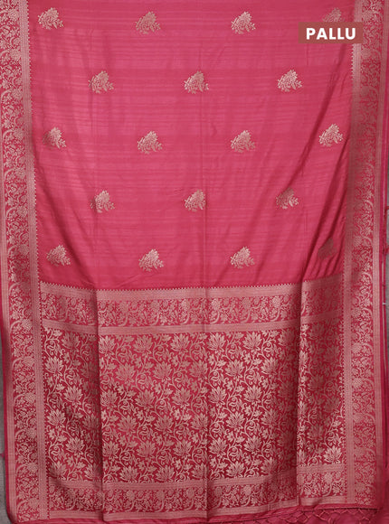 Semi soft silk saree dark peach pink with floral zari woven buttas and zari woven border