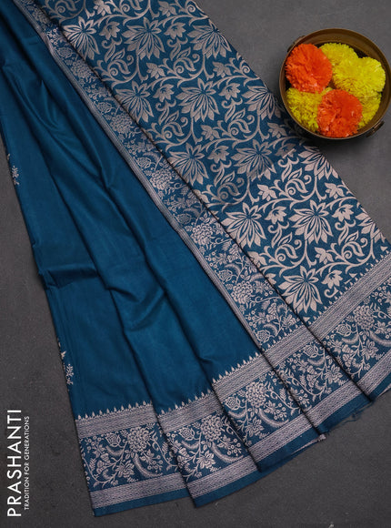 Semi soft silk saree cs blue with floral zari woven buttas and zari woven border