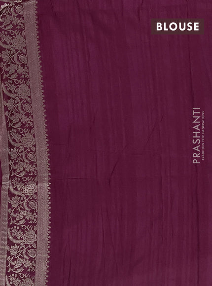 Semi soft silk saree wine shade with floral zari woven buttas and zari woven border