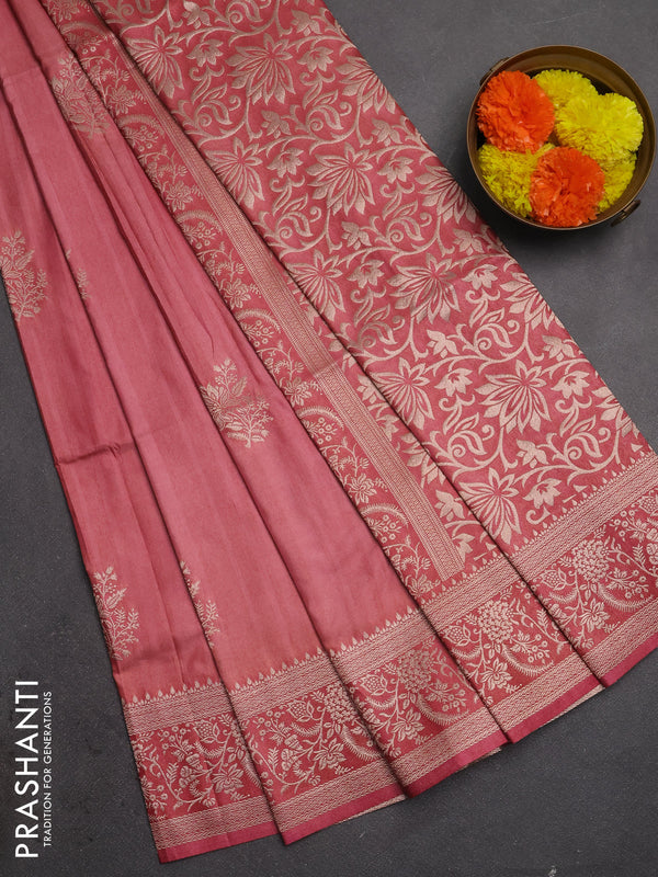 Semi soft silk saree peach shade with floral zari woven buttas and zari woven border