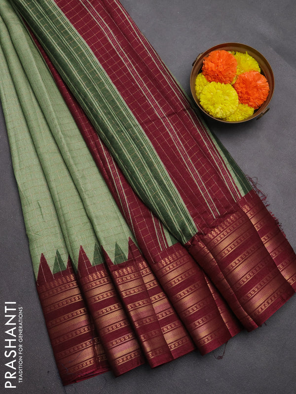 Semi raw silk saree pastel green and maroon with allover zari checked pattern and temple design zari woven border